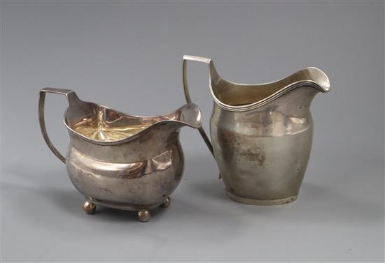 Two George III silver cream jugs, London, 1801 and 1808, 8 oz.